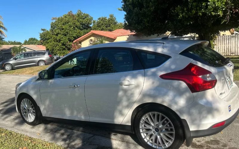 2014 Ford Focus · White rental vehicle