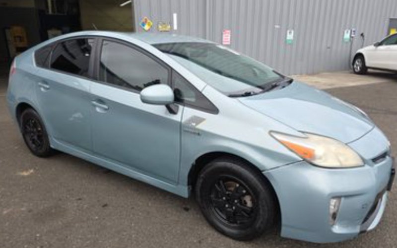 2015 Toyota Prius · Sea Glass Pearl rental vehicle
