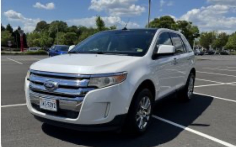 2011 Ford Edge Limited · White rental vehicle