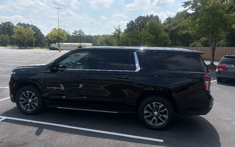 2021 Chevrolet Suburban · Black rental vehicle